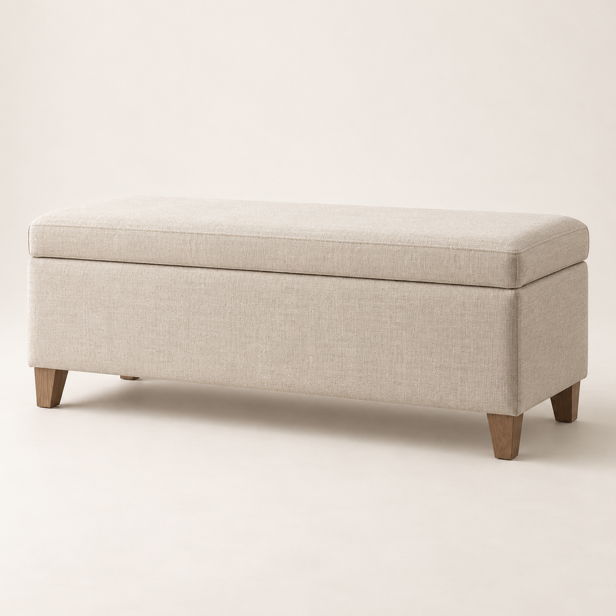 Example of a long oatmeal upholstered end-of-bed storage bench